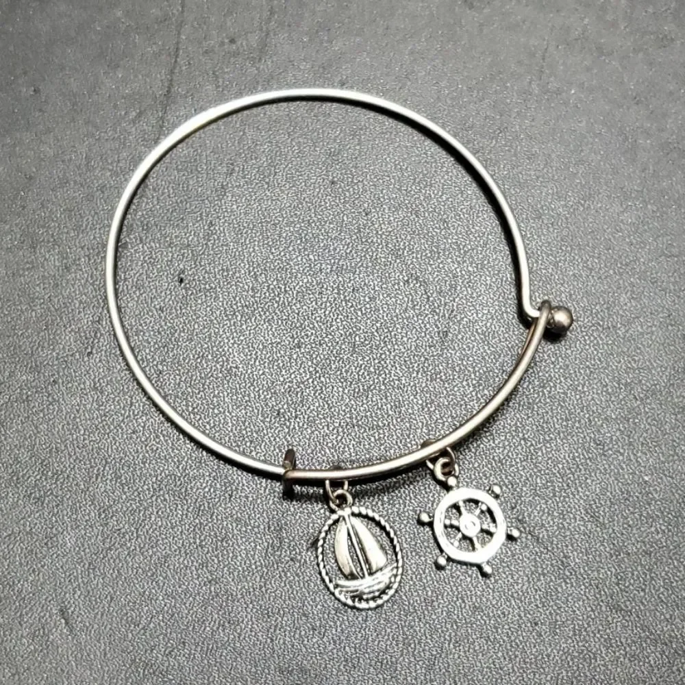Silver tone sailing themed charm bangle bracelet 7.25